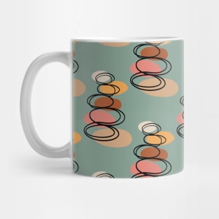 Modern minimalist balancing stones in earth tones illustration on calming green background Mug